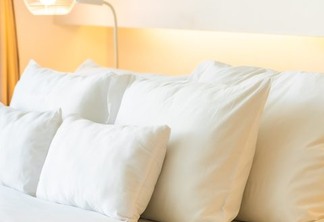 White pillow and blanket on bed decoration interior of bedroom