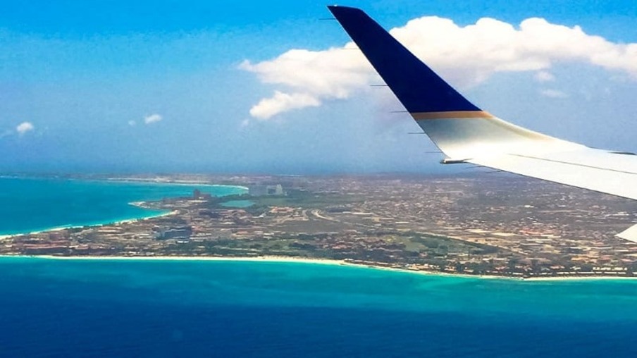 Como encontrar passagens aéreas baratas para Aruba